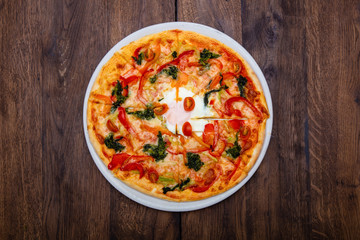 Classic Italian pizza on a wooden table