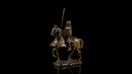 Steel statuette of a medieval knight on a warhorse