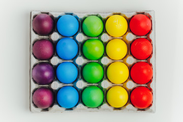 Easter festive multicolor eggs carton