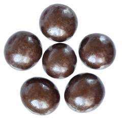 Chocolate balls close up top view isolated