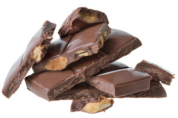 Broken milk chocolate with whole almond nuts Isolated