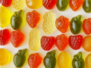 Assorted coloured candies. Closeup view