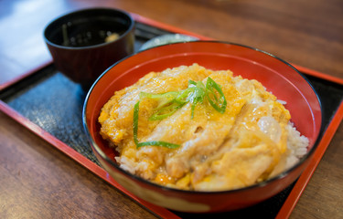 Tongkatsu and fresh egg on top with japanse rice