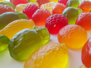 Assorted coloured candies. Closeup view