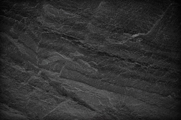 Dark grey black slate background or texture.