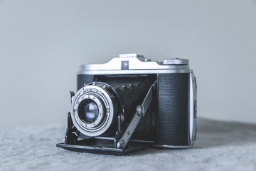 Old Vintage Camera on white Background Monochrome image