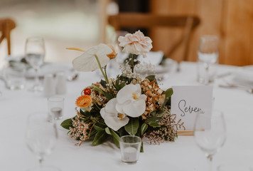 Wedding table decoration with modern floral centerpiece 