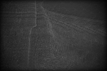 Dark grey black slate background or texture.