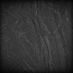 Dark grey black slate background or texture.