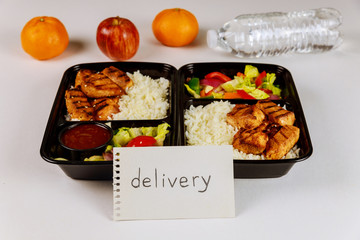 Healthy food delivery or take away lunch in container.