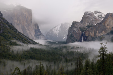 Clouds and fog in Yosemite Valley after a winter rain storm seen from Tunnel View