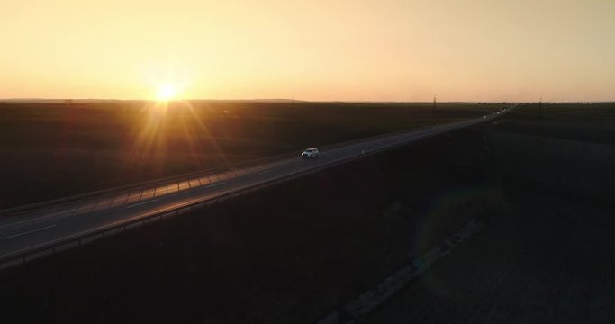Highway road on sunset, cop car, police patrols the roads