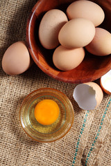Group of of raw chicken eggs on rustic background, Ingredient for Scrambled eggs in loft style kitchen