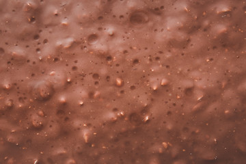 Sweet chocolate with nuts as background