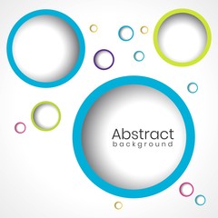 Abstract graphic background with colorful rings.