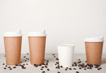 Takeaway coffee cups on table