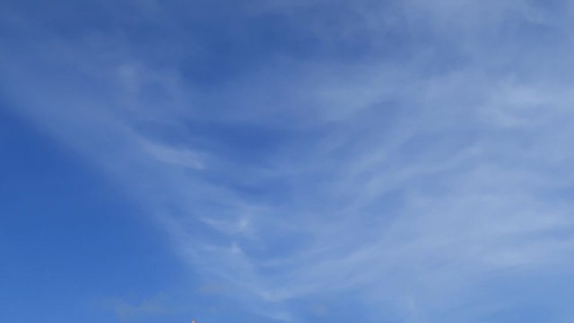 Beautiful white smoky fluffy cirrus & cumulus clouds on tropical summer or spring bright blue sky background in sunny day TimpLapse for transitional & meditative motion vdo or nature related project