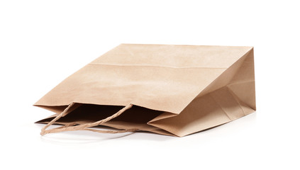 Paper shopping bag on white background