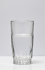glass of melting ice water