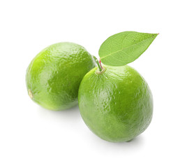 Fototapeta na wymiar Green limes on white background