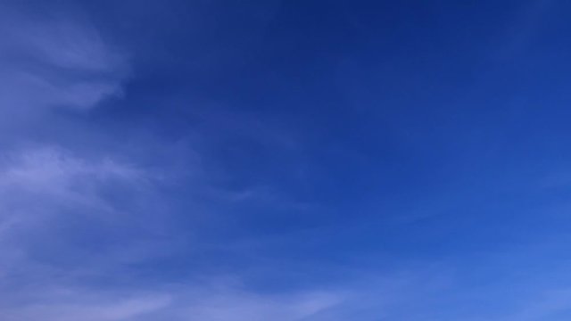 Beautiful white smoky fluffy cirrus & cumulus clouds on tropical summer or spring bright blue sky background in sunny day TimpLapse for transitional & meditative motion vdo or nature related project