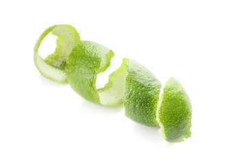 Peel of green lime on white background