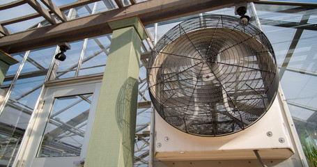 Ventilation system on greenhouse with security camera controlling access
