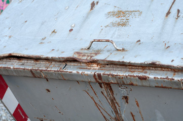 detail of a closed rusty metal container