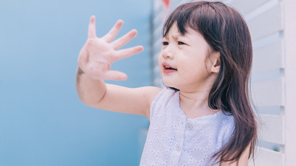 Hands contaminated with viruses. Asian girl with dirty hand.