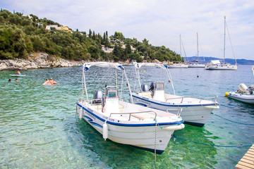 Fototapeta na wymiar Corfu Island beautiful beaches, waterviews, harbours, havens, boats, sea, water, Greece