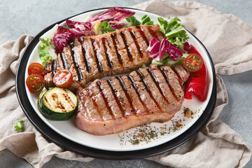 Grilled beef steak with vegetables