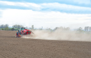 Fototapeta premium farmer seeding
