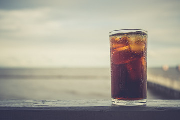 Cola with ice in the glass ready to drink for refresh