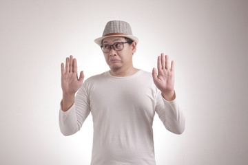 Young Man  Afraid With Arms Raise Up, Surrender Gesture