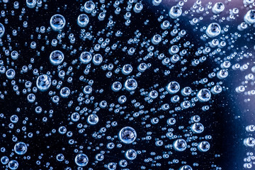 Water droplets on blue