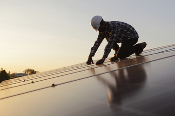 engineer working on checking and maintenance equipment at industry solar power.