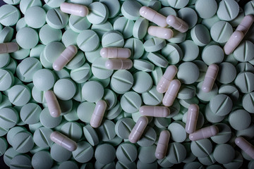 pills background. Drugs, painkillers, colds and other medicines macro