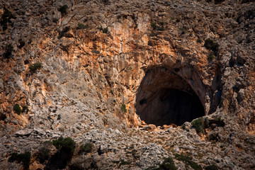 Big hole in a beautiful stone rock