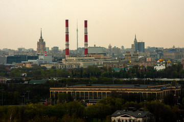Architecture of the city, houses, pipes, buildings and trees