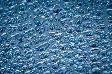 Water droplets on blue