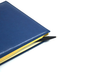 blank blue leather diary on white desk