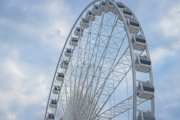 Ferris Wheel with blue sky on sunny day