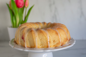 Raspberry Lemon Cake with tulips