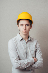 young man in a construction helmet