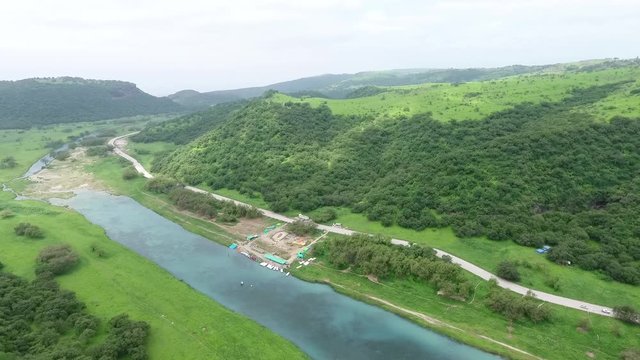 A surprising snapshot of the drone in the fall in Salalah, Ain Darbat, Sultanate of Oman