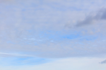 Clouds on a blue sky as a background
