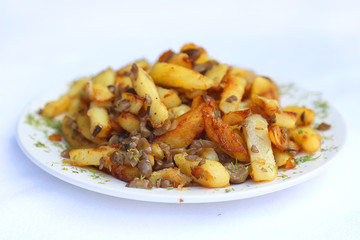 Fried potatoes with porcini mushrooms, dishes of Russian national cuisine
