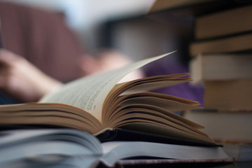 Coronavirus. Man reading in times of quarantine. Man locked up at home spends the afternoon reading.