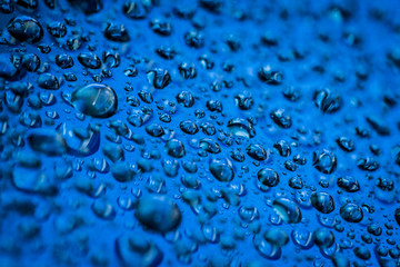 Water droplets on blue