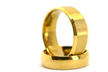 Close up of gold rings for wedding of bride and groom